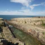 ...vista dall�alto assume i tratti di una vera e propria piscina dall�acqua trasparente